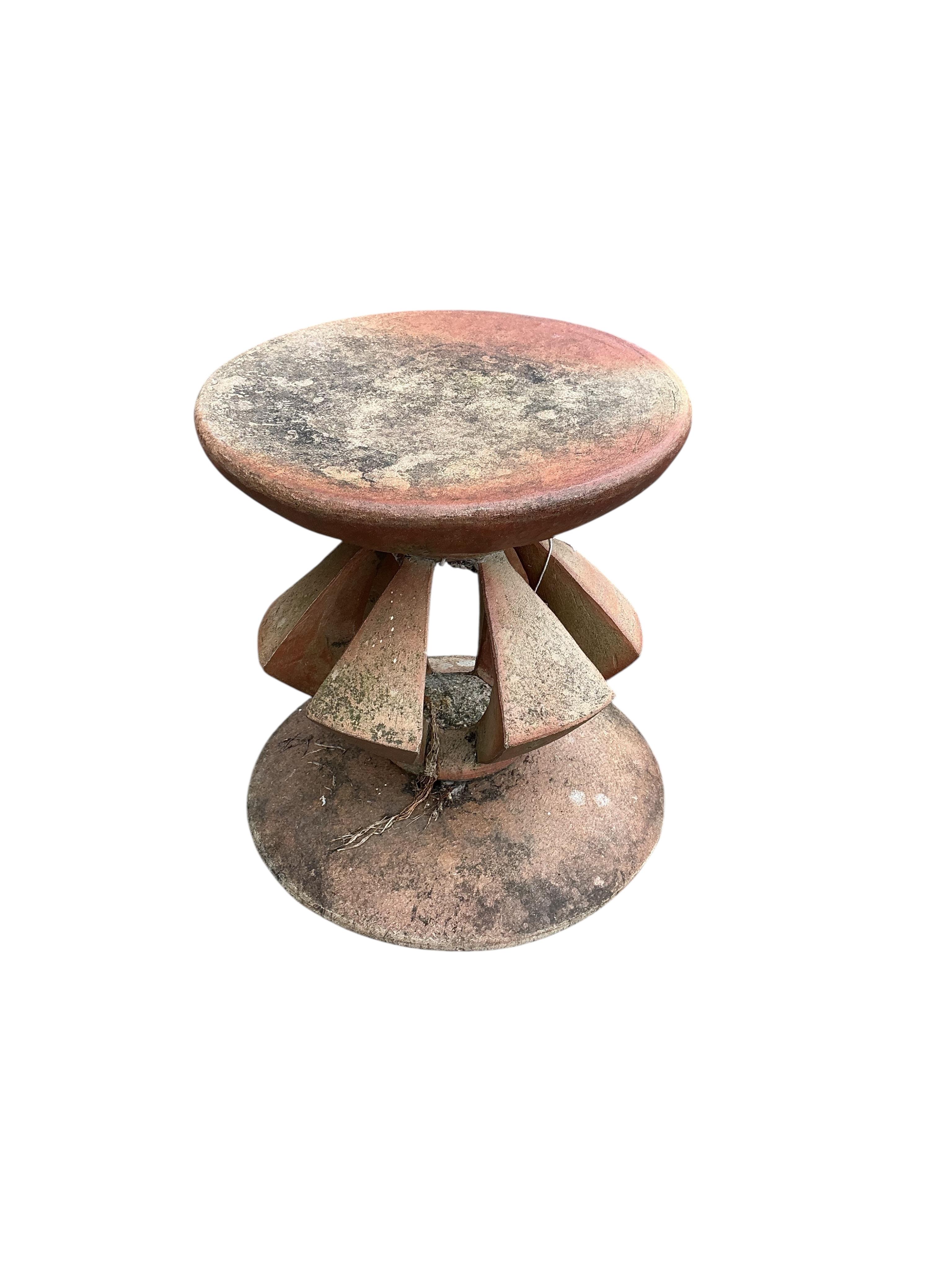An earthenware garden sculpture or stand, height 46cm